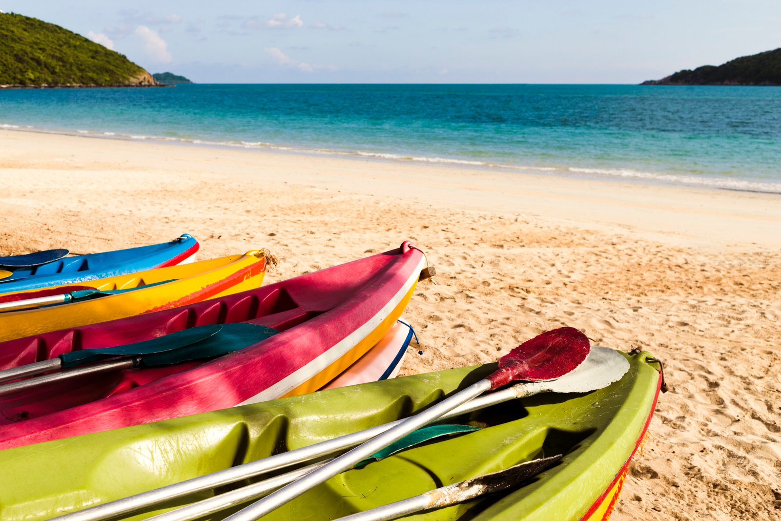 Colorful kayaks on the beach